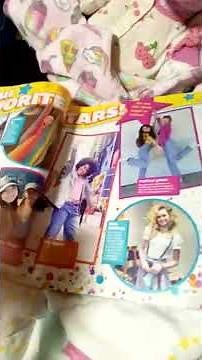 Reading the girls' world magazine with ❤️!