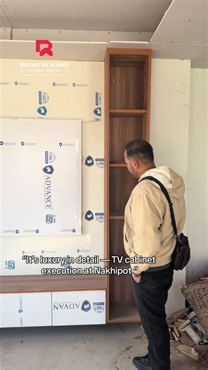 “Rupantar Homes by Gokul Kunwar delivers a luxury TV cabinet at the Nakhipot site, designed to enhance the living space with refined aesthetics and functional detailing. Crafted with premium finishes, clean lines, and smart storage integration, the TV cabinet reflects a balance of elegance and usability. This project showcases our expertise in creating luxury interior elements that elevate modern homes while maintaining practical everyday functionality.” \t1.\tModern TV cabinet design in Nepal f