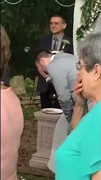 Groom overcome with emotion at the altar