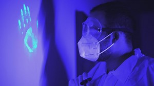 Taking and analyzing fingerprints under black light - Free Stock Video