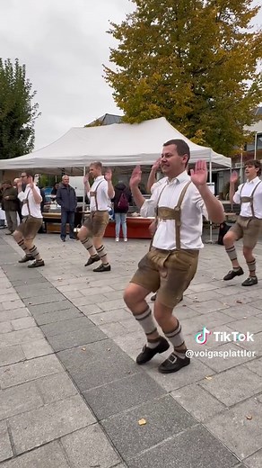 Traditional Dance Performance in a Mowed Meadow