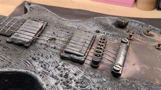 Ukrainian luthier restoring Gibson Les Paul that had been burned by Russian drone strike