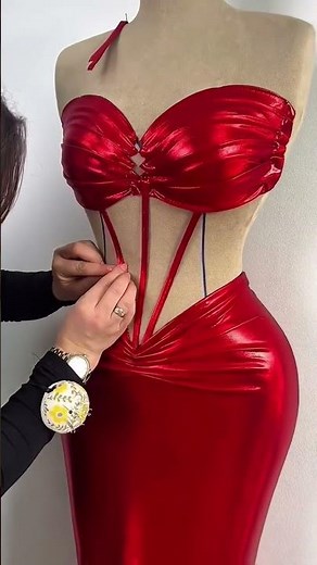 Share with a friend who would own the spotlight in this red satin corset gown! To order, send us a