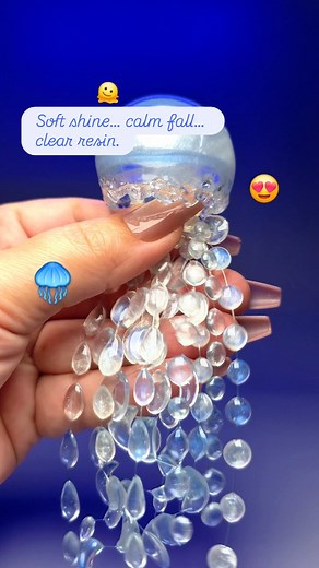 A Clear Dome With Flowing Drops A smooth transparent dome paired with soft resin drops. #resin #resinart #epoxyresin #handmade #aestheticcrafts #fblifestyle | Ольга Журавлева