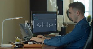 Man coding html and programming on screen Monitors, development web, developer.