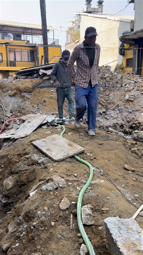 Team Bhargo on Instagram: "Pokhara worker carries & places reinforcement mat in eccentric footing trench! 🇳🇵💥 Watch this strong Bhargo worker carry the foundation mat (bottom rebar grid) and place it perfectly in the trench for our eccentric footing! 😮‍💨🛠️ This step sets up tensile strength against eccentricity, ensures proper spacing/cover, and preps for solid concrete pour – no shortcuts for lakeside durability 💪 From manual trench dig to this key reinforcement moment 🔥 Sound for satis