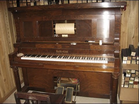 An exemplary 1912 foot pump player piano by Bush & Lane