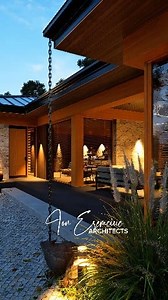 Casa V&DM – A Sanctuary by the Forest with Mountain Views Tucked at the edge of a forest near Sibiu, Casa V&DM is a warm, elegant retreat where stone, wood, and glass meet to create harmony with nature. With its L-shaped layout, large panoramic windows, and generous covered terrace, this single-level villa opens fully to the surrounding landscape and distant mountain views. Crafted for both comfort and sophistication, it blends contemporary lines with rustic textures — ideal for peaceful living 