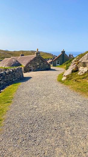 Gearrannan Blackhouse Village, on the Isle of Lewis in the Outer Hebrides, is a restored Scottish blackhouse settlement overlooking the Atlantic. Set among rugged cliffs and coastal scenery, it offers a glimpse into traditional crofting life in Scotland. Visitors can explore museum houses, enjoy walking trails, and stay overnight in self-catering accommodation. It’s a memorable stop for those interested in Scottish history, culture, and the wild beauty of the Western Isles. #scotland #visitscotl