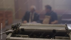 Court room transcript being typed by a stenographer