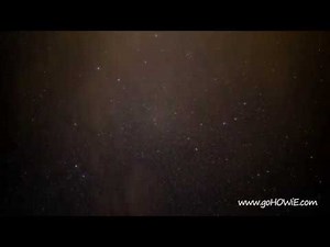Time lapse showing stars and constellations moving across the night sky