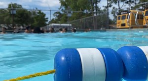 Thousands of kids learn to swim in the World's Largest Swimming Lesson