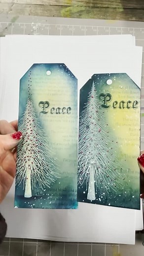 Lavinia Stamps on Instagram: "Using an Embossing Technique to create a magical Christmas tree Tag ❄️🎄 Quick Crafts: Join Tracey in this tutorial as she shows how you can use an emboss technique with the Wild pine tree stamp to create a mystical winter scene, Tracey also demonstrates a beautiful way to create a magical atmosphere around with small sparkling details and that wonderful winter snow effect ❄️ This would be perfect as a gift this Christmas or to tag onto a present, and with few produ