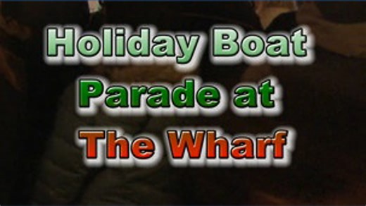 Holiday boat parade lights up the wharf