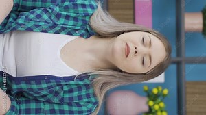 Vertical video of Sick woman with rapid breathing. The woman cannot control her breathing.