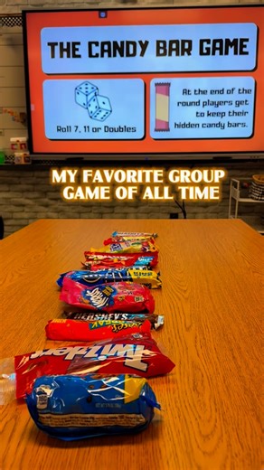 Kelsey • LoosliLearning on Instagram: "This is my favorite group game of all time. What started as a family tradition has turned into one of the most loved games I play in my classroom. The Candy Bar Game is full of laughter, strategy, and chaos, in the best way. It works with any group: students, family, friends, staff parties, you name it. It teaches social skills like using names, taking turns, paying attention, and how to win or lose with fun and respect. I use it in the fall, but you can pl