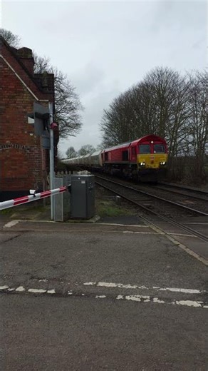 Class 66 Diesel Freight Hauling Aggregate At Rail Crossing. #railway #train #trainspotting