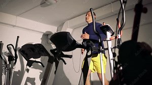 Sportsman on a racetrack in a gym in 4k