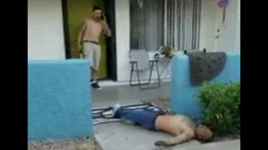 Damn: Dude Gets Knocked Out With A Bat After Pulling Up To Someone's House!