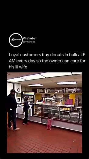 @virahubs on Instagram: "A resurfaced clip from 2018 revisits an extraordinary moment of community solidarity at Donut City in Seal Beach, California. Each morning, customers began lining up as early as 5 a.m., purchasing donuts in bulk so the small shop would sell out quickly. Their goal was simple: allow owner John Chhan to close early and spend the day caring for his wife, Stella, who was recovering from a brain aneurysm. The routine worked. By 7 a.m., the shelves were empty, ensuring Chhan c