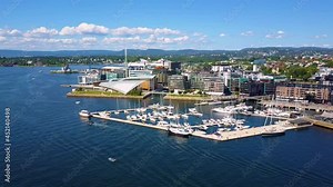 Oslo harbor at the Aker Brygge and Tjuvholmen neighbourhood aerial view in Oslo. Oslo is the capital of Norway.