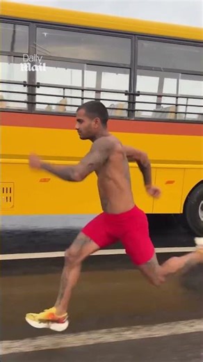 Lightning fast man outruns a bus