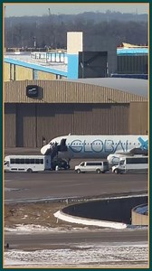 Busloads of what appeared to be detained individuals were loaded onto what is believed to be a deportation flight operated by GlobalX Airlines at MSP airport. | Bring Me The News
