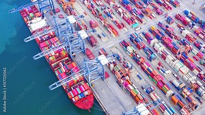 4K Time lapse industrial port with containers from top view or aerial view. It is an import and export cargo port where is a part of shipping dock