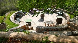 clip-25219922-wooden-tables-chairs-on-summer-area-cafe