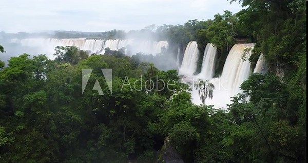 Drone departure from one of the balconies at Parque Nacional del Iguazú in Argentina, unveiling hidden falls belonging to the magnificent Iguazu Falls.