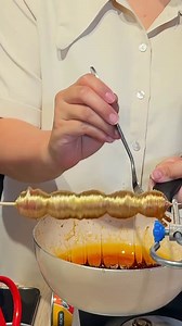 Ever tried Tanghulu(candied fruits) wrapped in golden sugar threads? Crunchy, shiny, and totally irresistible! #tanghulu #chinesestreetfood #fun #Chinesesnack Credit to 34258239802 on Douyin. | Young China