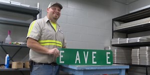 How are street signs made?