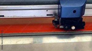 Cutting plotter close-up. The process of cutting a vinyl film Stock Video