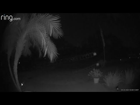 2 mysterious orbs of light caught on camera flying through Palm Coast yard