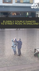 Adorable! An elderly couple dancing to music played by a band in the street on a nearly empty town square delighted onlookers in England. 🥰♥️ | ABC7