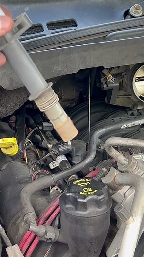 Replacing ignition coils and spark plugs in a Durango.