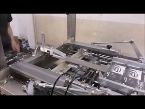 BOX OVERWRAPPING MACHINE