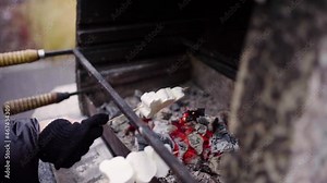 How to perfectly roast marshmallows over an open fire at a campsite
