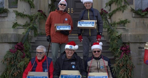 Support this year’s Christmas Parade by buying a button