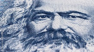 Karl Marx portrait on East German banknote tracking. Dolly shot. Low angle, macro. 4K