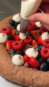 The kinda dessert that ends with two fingers deep. #fruitpizza#desserttime#makeherhappy Dessert Pizza with Brioche Dough: Makes 1 Pizza Difficulty - Easy Tools: 3 piping bags, parchment paper. Note: There are plenty of other garnish ideas you could follow through with. For example, you could add bananas, Nutella, crushed biscuits, and caramel sauce slices. Ingredients: 1 Egg 105g Lukewarm milk 90g Cool pieces of cubed unsalted butter 7g dry yeast 240g Flour 10g Cacao powder 3g Sea salt 32g Sugar