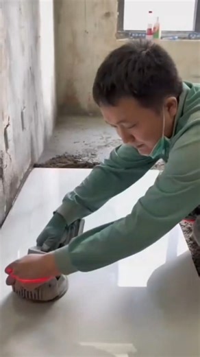 Installing floor tiles using a professional vibration leveling tool