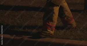 Firefighter walking at emergency scene