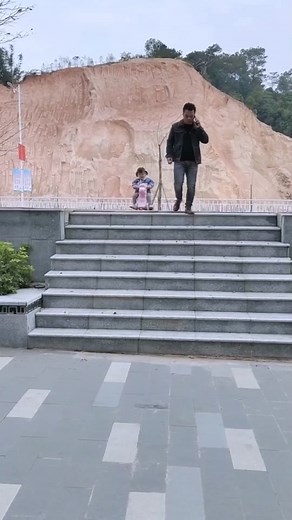 Adorable Child Scooter Adventure with Funny Fall