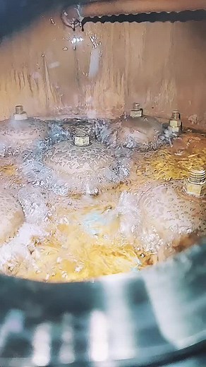 Vapors in the distillate come in contact with the caps inside the column condensing into a liquid and falls back down the column. #bourbon #whiskey