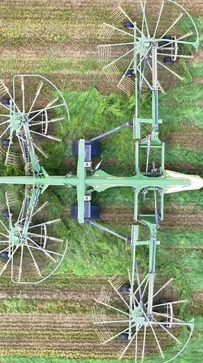 Chris in the New Holland tractor with Krone swadro rake in slow motion #farming | Pro Horizon Farming Content