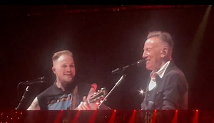 Springsteen flies 3,000 miles to surprise fans, jam with country superstar at concert