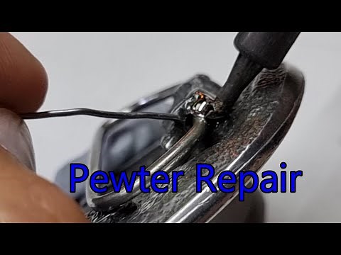 Repairing my favorite pewter belt buckle.