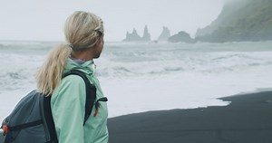 Woman Green Raincoat Walking On Black Stock Footage Video (100% Royalty-free) 1066318015 | Shutterstock