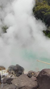 Umi Jigoku is largest among the Beppu Jigoku hot springs. The beautiful cobalt blue color is due to iron sulphate in the hot spring water Beppu Oita Japan - Landscape Travel nature original